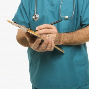 2245847-mid-adult-caucasian-male-doctor-taking-notes-on-a-patient-s-chart-300x300